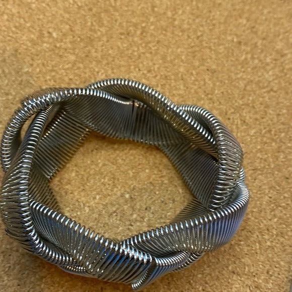Braided wire metal slinky paperclip style stretch bracelet