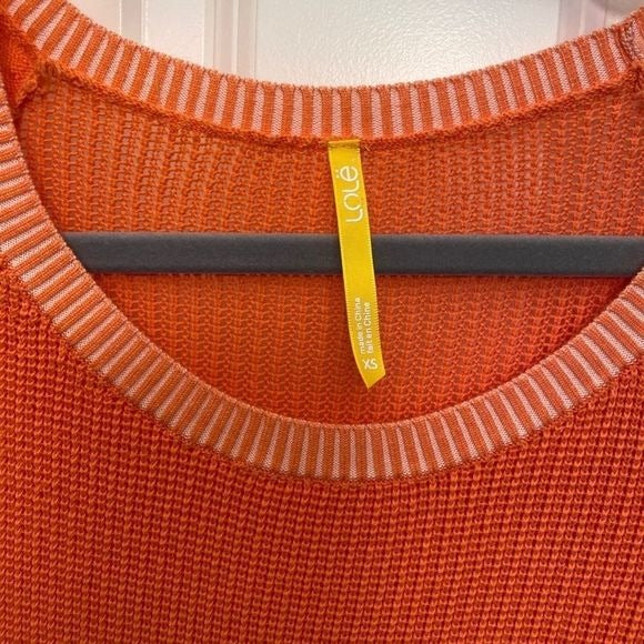 Lolë orange sweater size xs