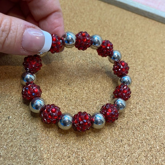 Red and silver beaded bracelet looks like candy or delicious berries